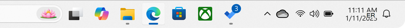 Skjermbilde av Oppgavelinjen i Windows med en app som viser et merke.